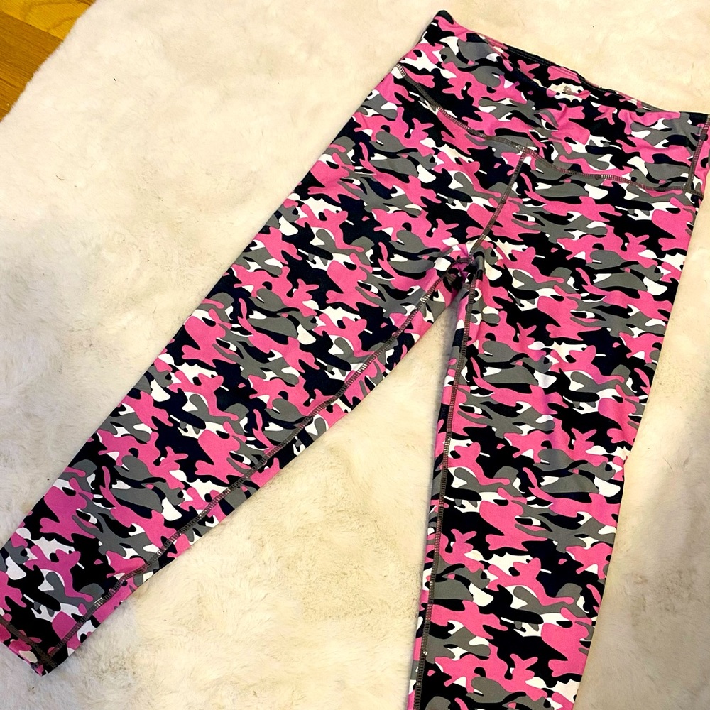 90 degree. Pink camo leggings.